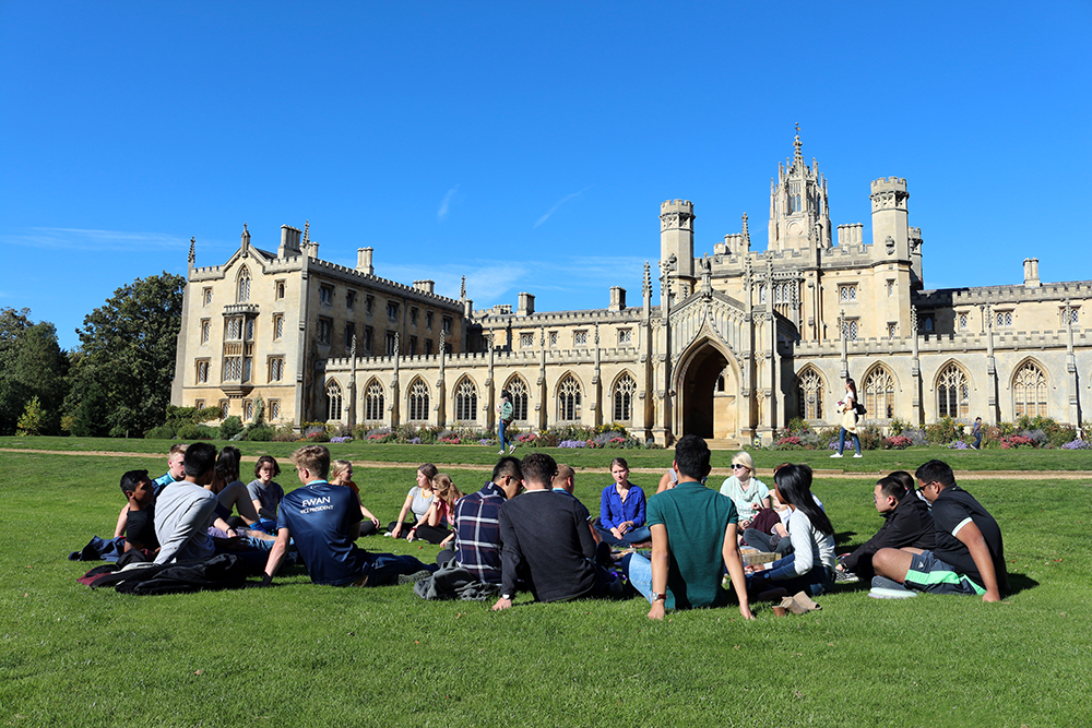 New students having a picnic near New Court